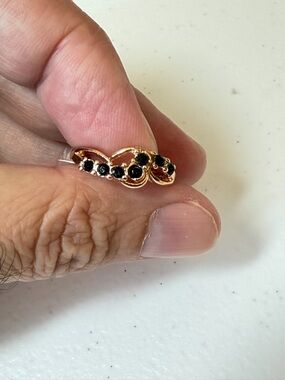 Gold and Black Gemstone Ring.